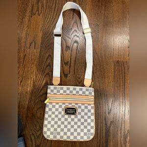 Louis Vuitton crossbody. only 1 minor stain on strap. Great condition.